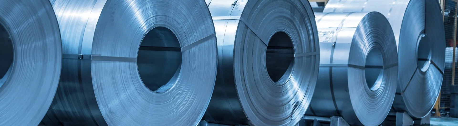 Industrial packaging steel coils in warehouse